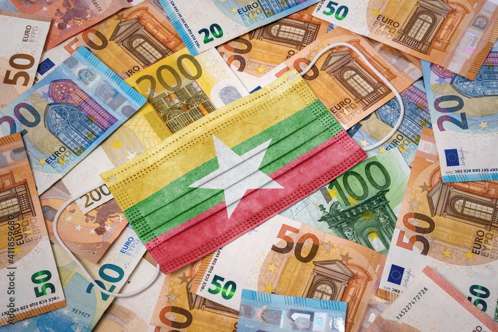 Medical mask with the flag of Burma on a variety of european banknotes.(series) Medical mask with the flag of Burma on a variety of european banknotes.(series)
