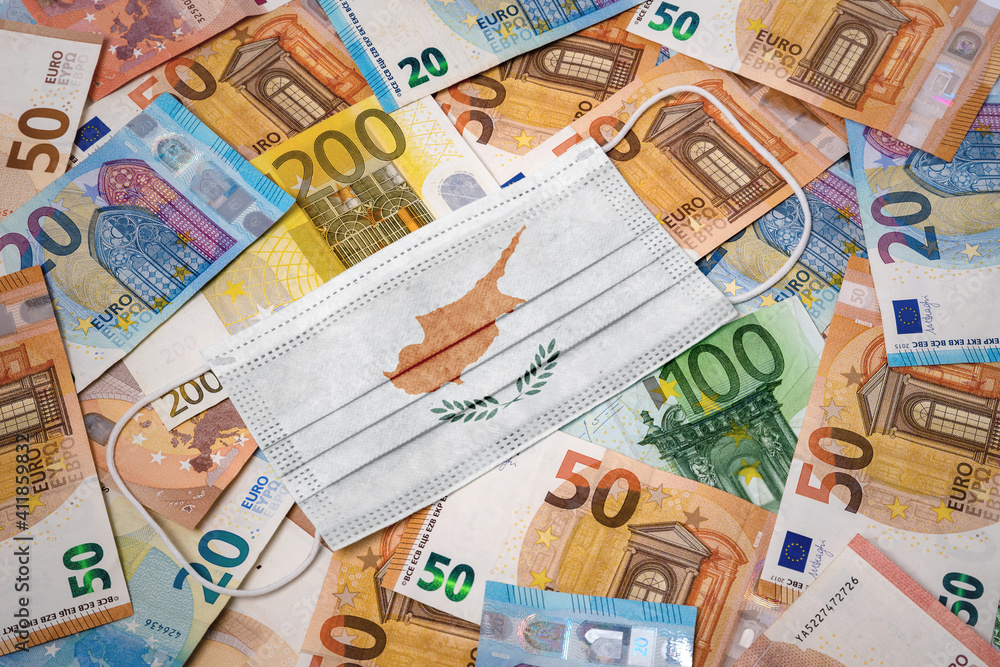 Medical mask with the flag of Cyprus on a variety of european banknotes.(series)