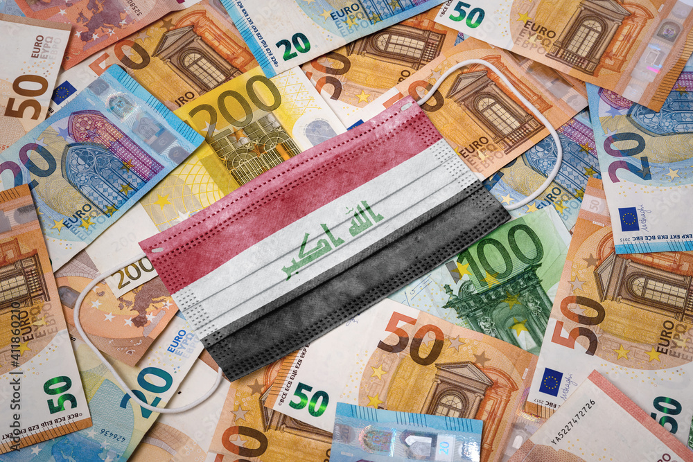 Medical mask with the flag of Iraq on a variety of european banknotes.(series) Medical mask with the flag of Iraq on a variety of european banknotes.(series)