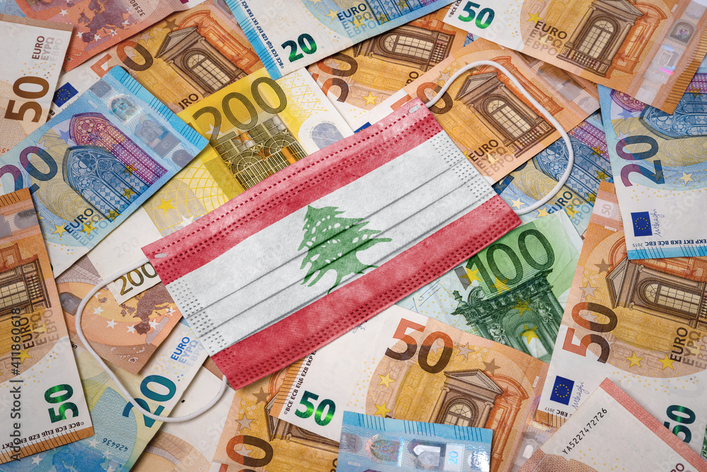Medical mask with the flag of Lebanon on a variety of european banknotes.(series) Medical mask with the flag of Lebanon on a variety of european banknotes.(series)