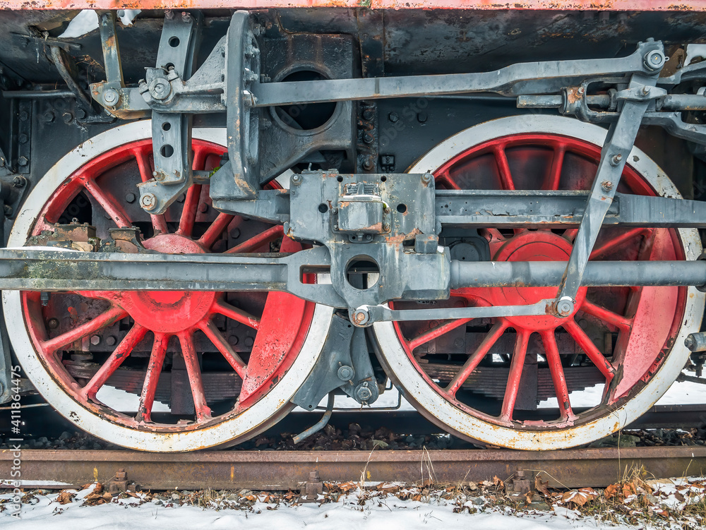 Close up with train wheels on track. Wheels of a train on the railway tracks. Close up with train wheels on track. Wheels of a train on the railway tracks.