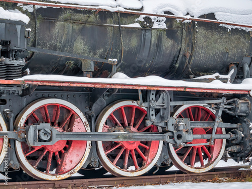 Close up with train wheels on track. Wheels of a train on the railway tracks.