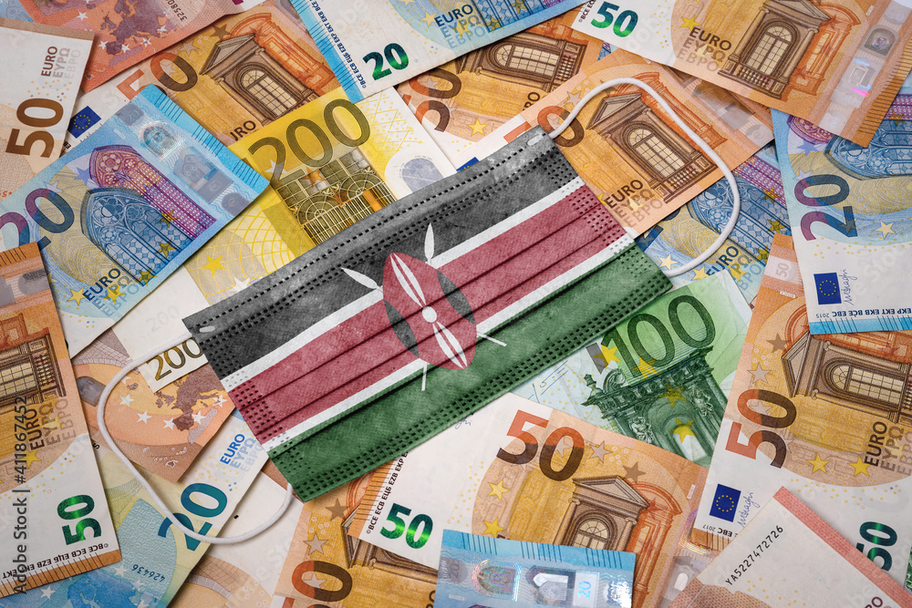 Medical mask with the flag of Kenya on a variety of european banknotes.(series) Medical mask with the flag of Kenya on a variety of european banknotes.(series)