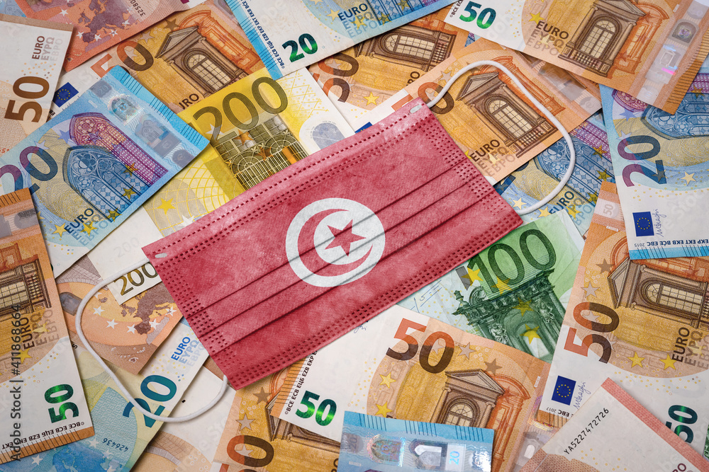 Medical mask with the flag of Tunisia on a variety of european banknotes.(series) Medical mask with the flag of Tunisia on a variety of european banknotes.(series)