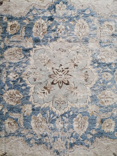 shabby carpet top view. the effect of an aged carpet. vintage texture for interior decor.