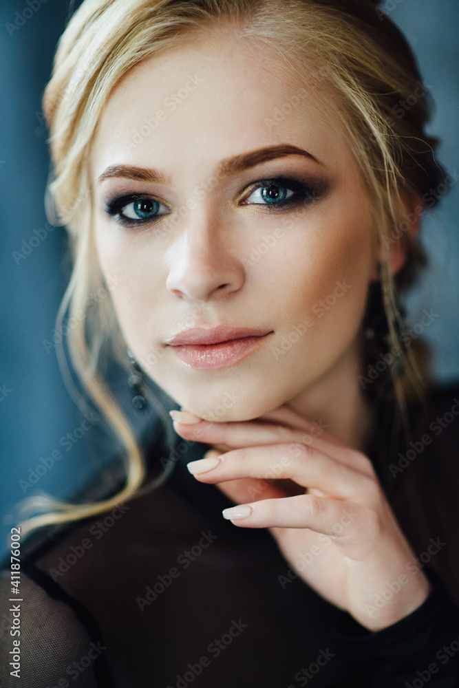 Pretty Blonde Girl With Blue Eyes