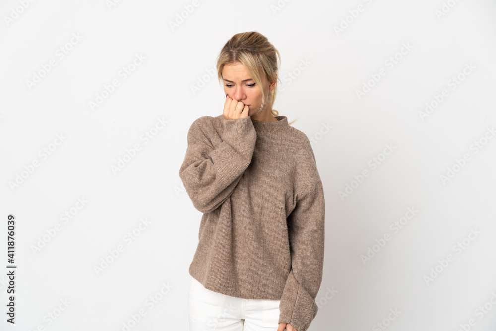 Young Russian woman isolated on white background having doubts Young Russian woman isolated on white background having doubts