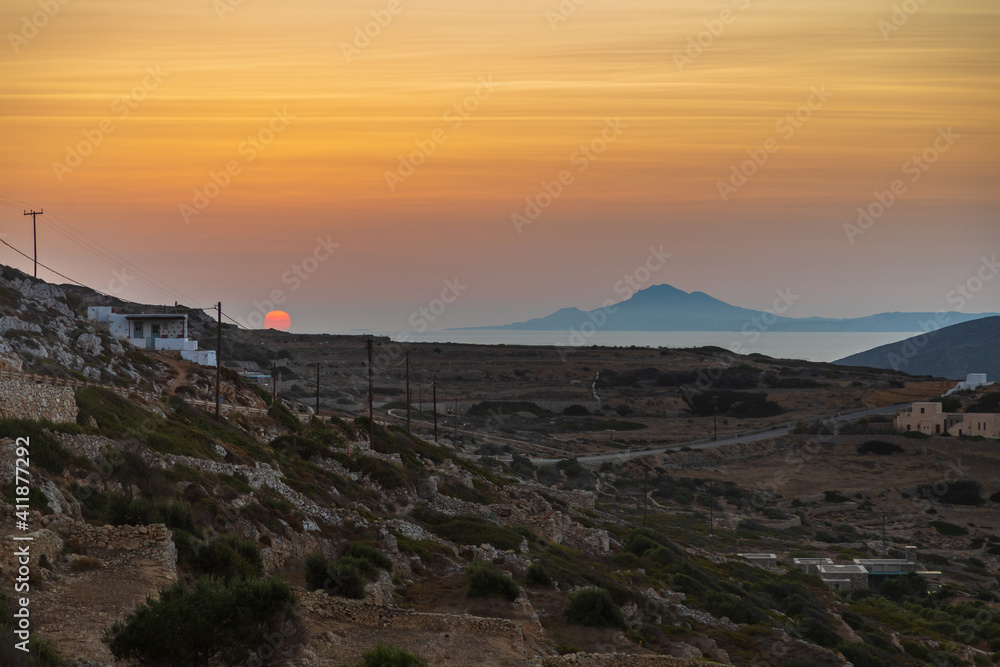 Sunset over the old town of Chora, Folegandros Island, Greece.