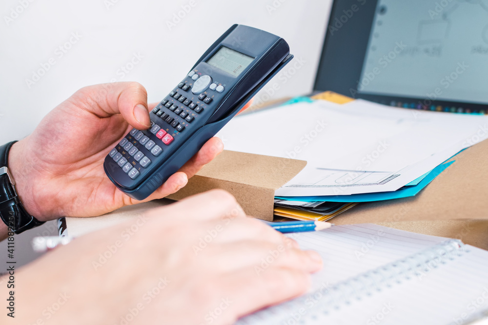 Businessman Calculating, taking care of finance. Businessman Calculating, taking care of finance.