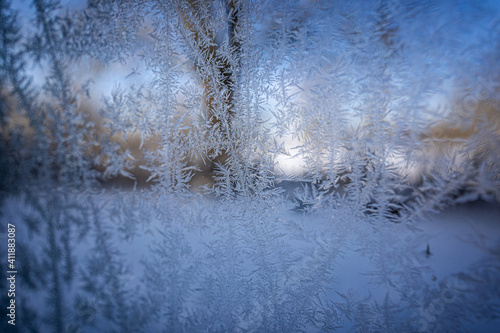 Frozen window with ice / frost pattern.