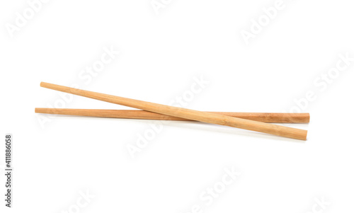 pair of wooden chopsticks isolated on white background