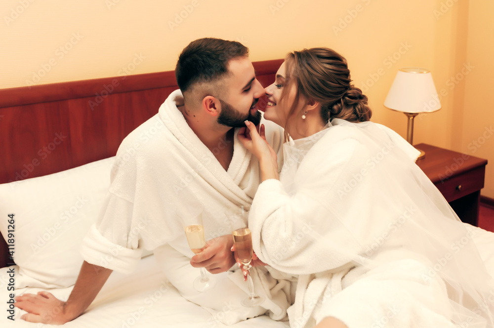 lovers in the bedroom in bathrobes
lovers in the bedroom in bathrobes