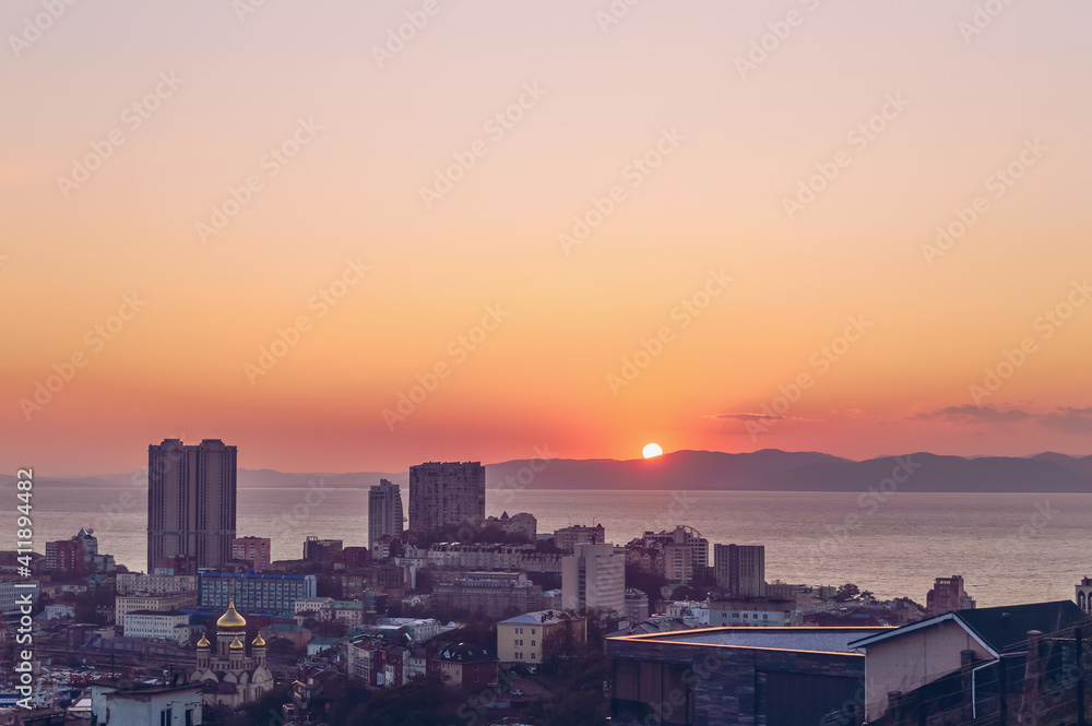 sunset cityscape of Vladivostok with red skies