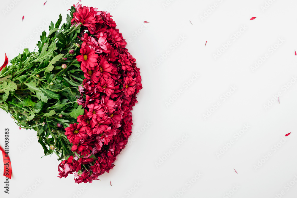 Valentine's day background. Bouquet of red chrysanthemum. Present gift for holiday. Space
