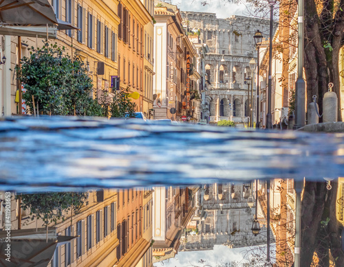 Canvas Print Rome, Italy - in Winter time, frequent rain showers create pools in which the wonderful Old Town Rome reflects like in a mirror