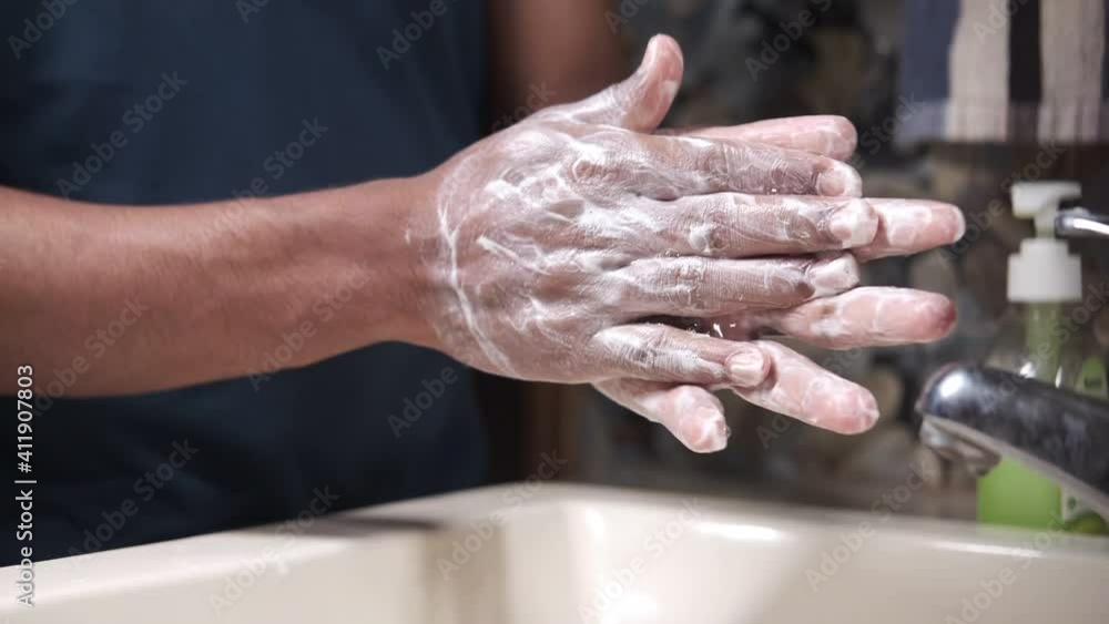 washing hands with soap warm water close up washing hands with soap warm water close up