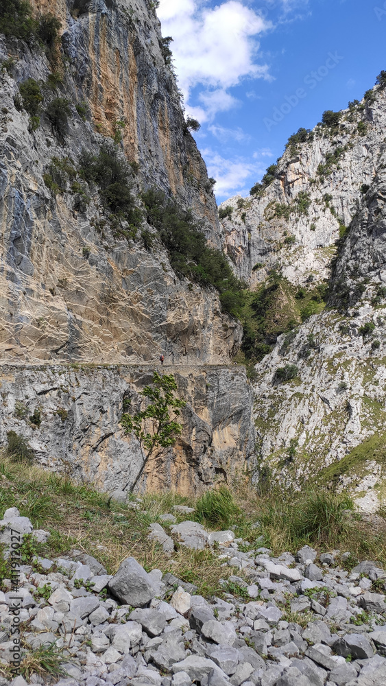 The Cares Route in the heart of Picos de Europa National Park, Cain-Poncebos, Asturias, Spain. Narrow and impressive canyon between cliffs, bridges, caves, footpaths and rocky mountains.