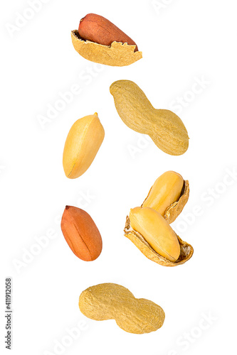 Isolated nuts. Seven mix peanuts with and witout shell in the air isolate on white with clipping path as package design element. Full depth of field. Food levitation concept. photo