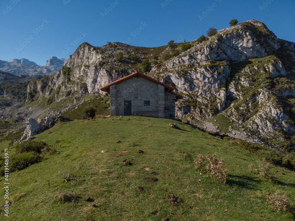 Fototapeta premium Alpine mountain hut cabin cottage between Lago de Enol and Ercina lakes of Covadonga, Picos de Europa, Asturias, Spain, Europe.
