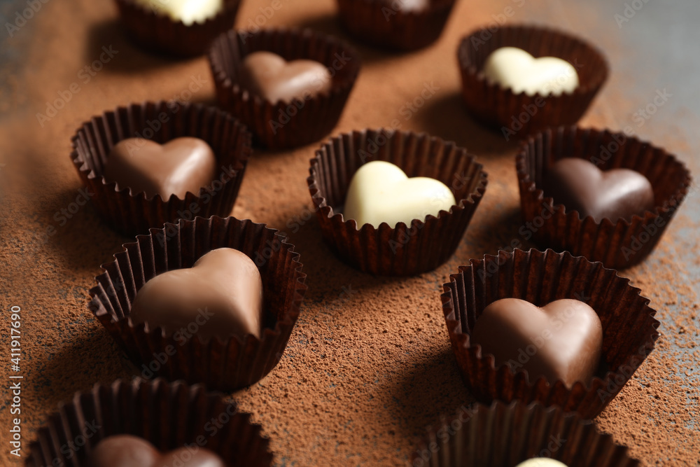Beautiful heart shaped chocolate candies on table Beautiful heart shaped chocolate candies on table