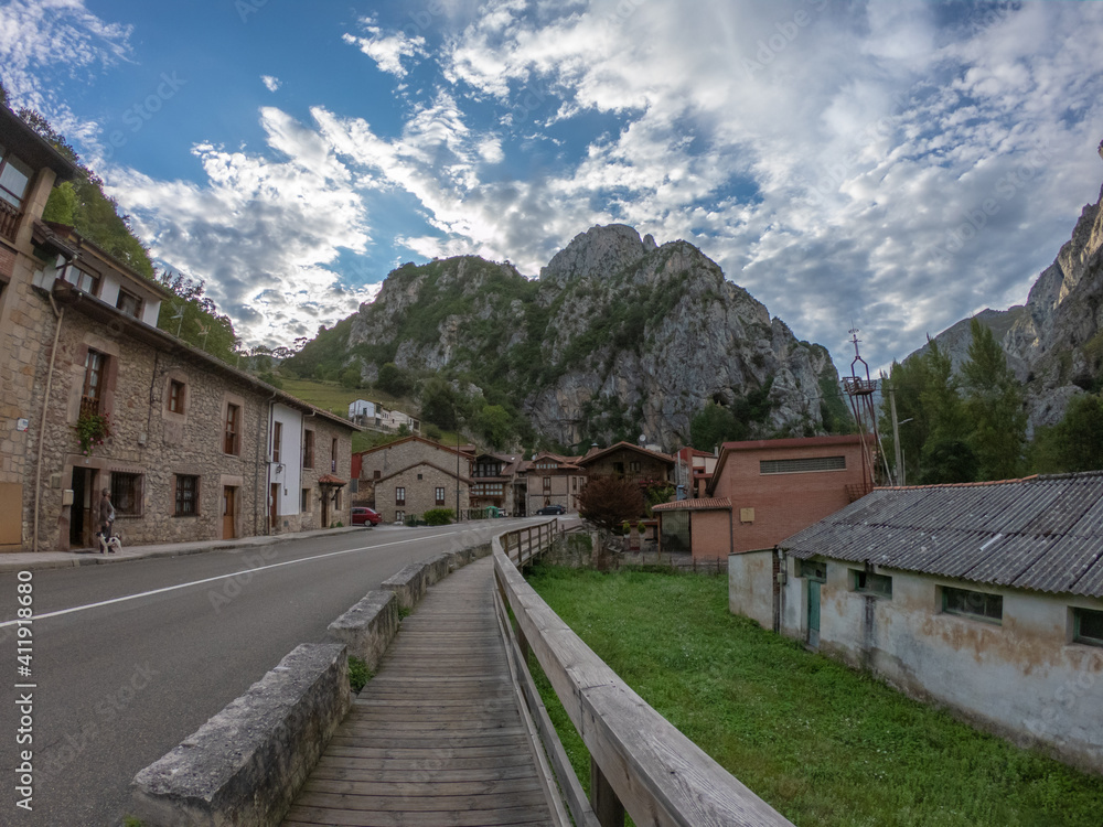 Fototapeta premium La Hermida, Spain, August 31, 2020: The pretty village of Hermida in the heart of the Desfiladero de la Hermida gorge, Picos de Europa Park, Cantabria, Spain.