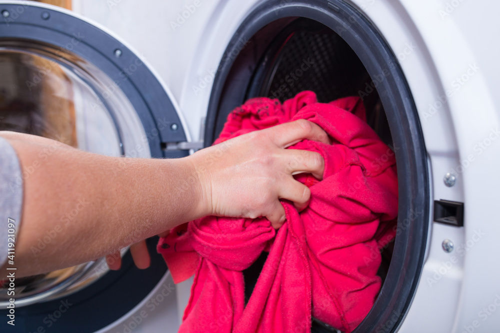 Laundry day. derty clothes to washing machine. Laundry day. derty clothes to washing machine.