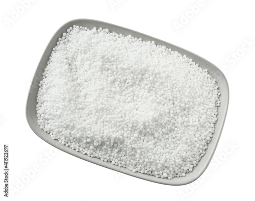 Pellets of ammonium nitrate isolated on white, top view. Mineral fertilizer