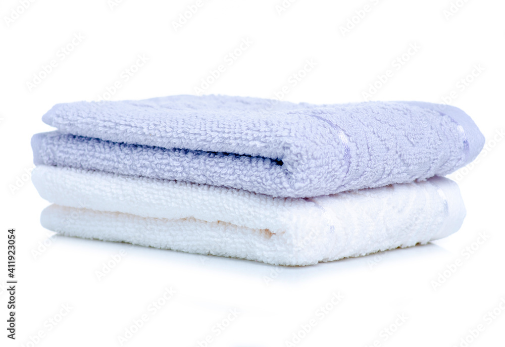 White and gray towels on white background isolation White and gray towels on white background isolation