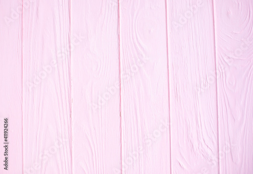 Pink wooden background. Pink wood texture with natural patterns.