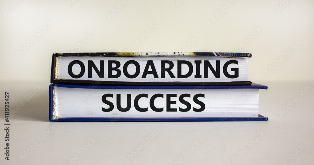 Onboarding success symbol. Books with words 'onboarding success' on beautiful white background. Business and onboarding success concept. Copy space.