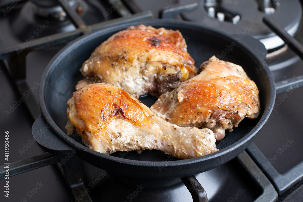 Fried chicken in a pan, homemade food Fried chicken in a pan, homemade food