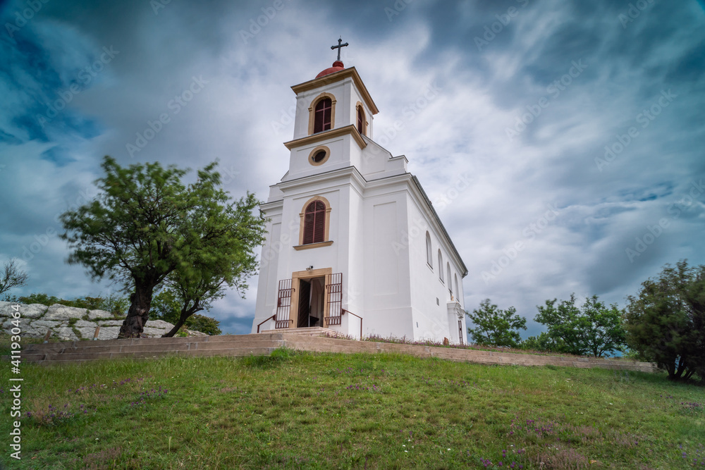 Chapel in Pecs, hungary with cloudy sky, long exposure photo