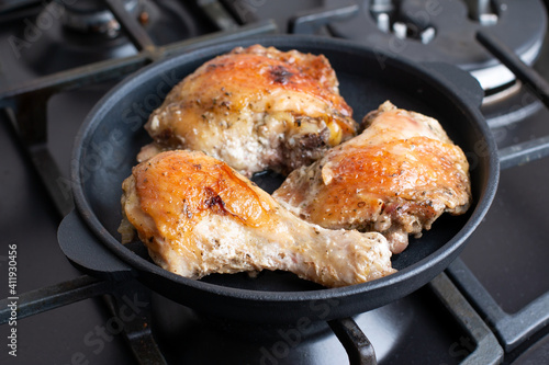 Fried chicken in a pan, homemade food