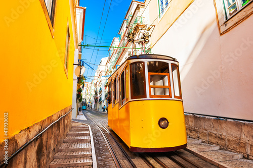 Yellow funicular on the railway in Lisbon, Portugal. Famous travel destination
