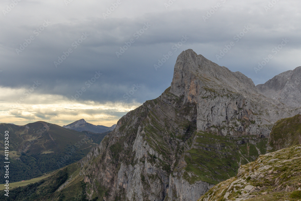 The Majestic mountains of the Eastern Massif of the Picos de Europa. Eagle flying over Pena Remona. The Eastern Massif, or Andará, between the Duje and Hermida gorges.