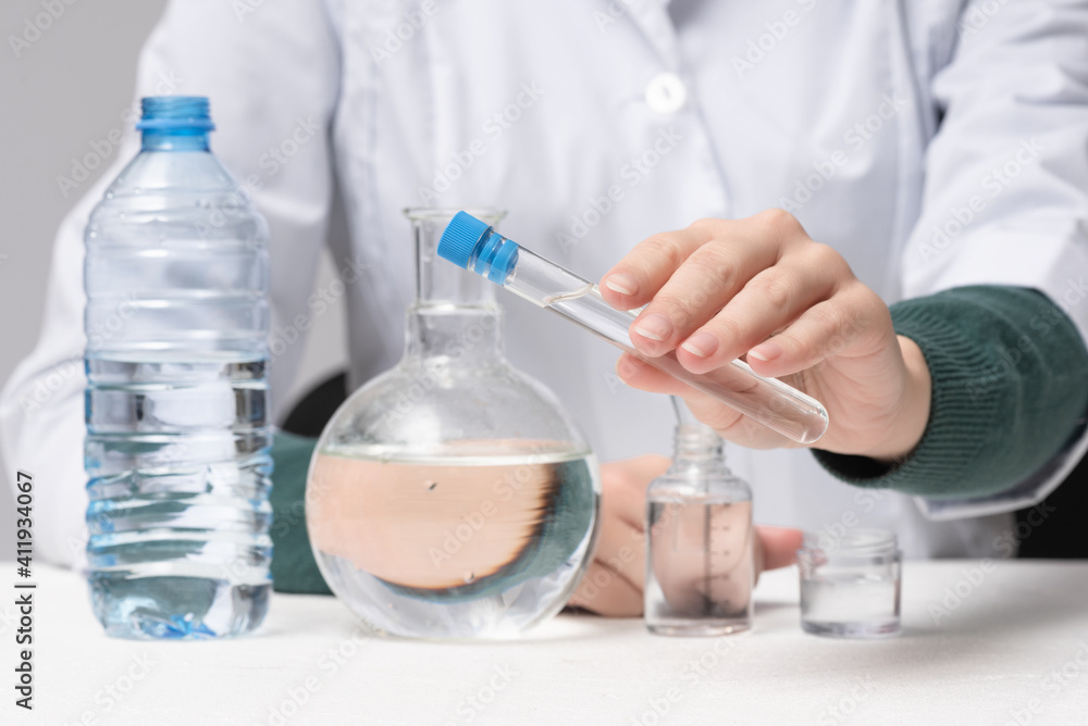 Scientist is analysing and testing a water concept.