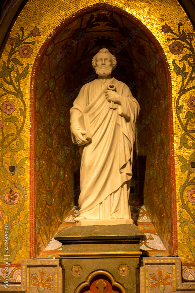 Lourdes, France, June 24, 2019: One of the statues in the Basilica of the Immaculate Conception in Lourdes,