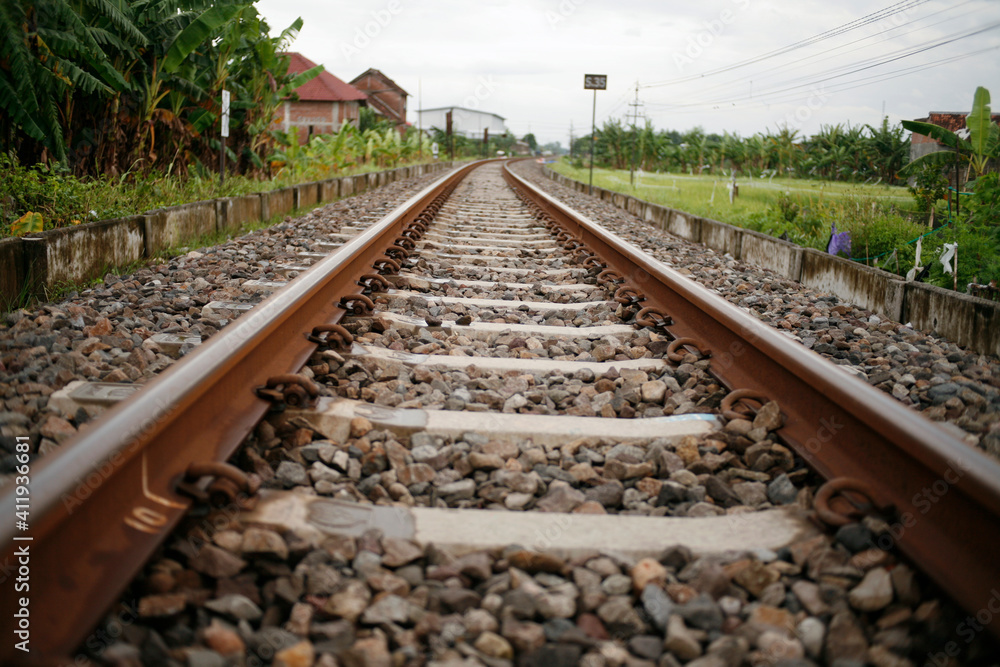 railroad tracks in the countryside in java Indonesia