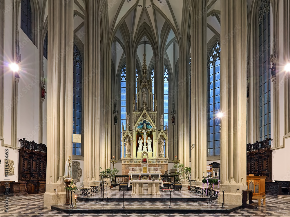 Brno, Czech Republic. Chancel, choir and altar of Church of St. James the Great in the evening. Present church was built in the 15th-16th century. Neo-Gothic interior was created in 1871-1881.