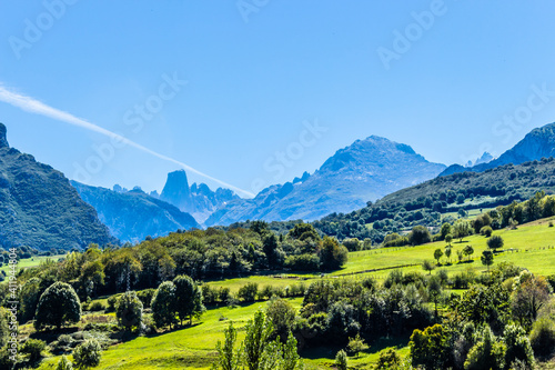 The Naranjo de Bulnes, known as Picu Urriellu, viewed from Las Arenas in Cabrales, Picos de Europa National Park in Asturias, Spain. photo