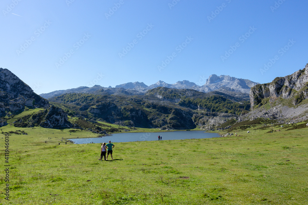 View of glacial Lake Ercina or Lagoa de la Ercina, nestled among marvelous mountain tops, Lakes of Covadonga Track, Cornion Massif, Picos de Europa National Park, Asturias, Spain. View of glacial Lake Ercina or Lagoa de la Ercina, nestled among marvelous mountain tops, Lakes of Covadonga Track, Cornion Massif, Picos de Europa National Park, Asturias, Spain.