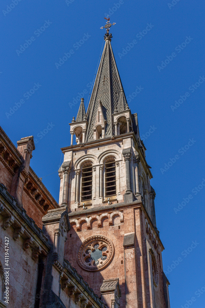 Covadonga, Spain - September 4, 2020: The Basilica of Covadonga (Basilica de Santa María la Real de Covadonga) in Covadonga, Asturias, Spain. Covadonga, Spain - September 4, 2020: The Basilica of Covadonga (Basilica de Santa María la Real de Covadonga) in Covadonga, Asturias, Spain.