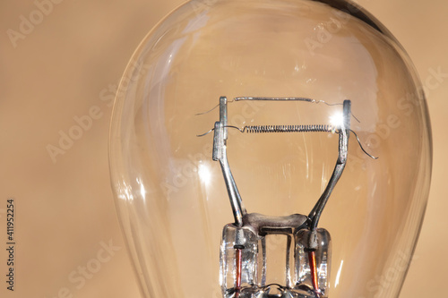 Close-up of a car lamp. Filament bulb for side lights and headlights © yanik88