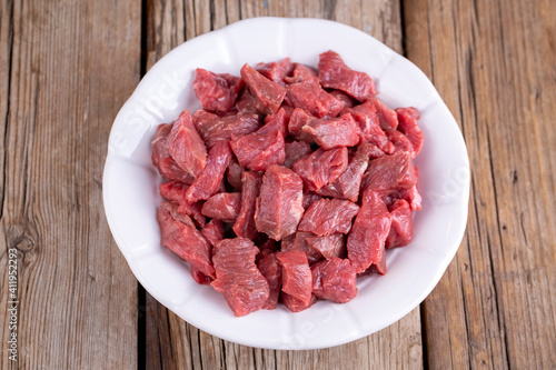 Heap of raw chopped beef is...