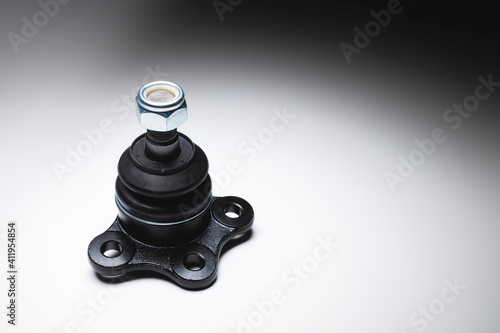 New spare parts axel car elements. off-road Ball joint car suspension on a gray background.