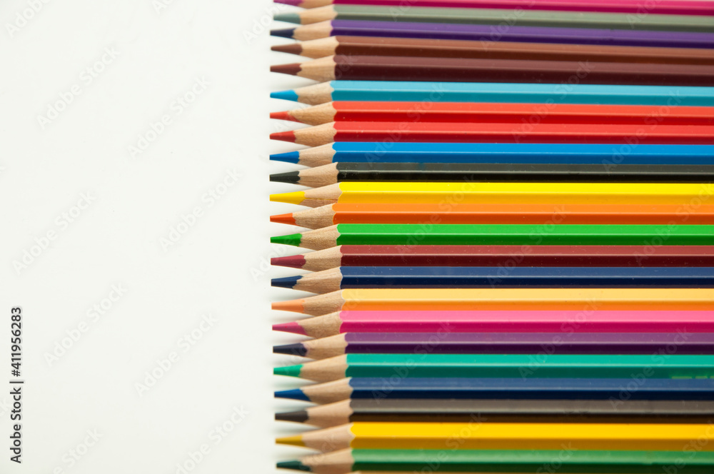 colored pencils on a white background. education concept. illustration of training. colored pencils on a white background. education concept. illustration of training.