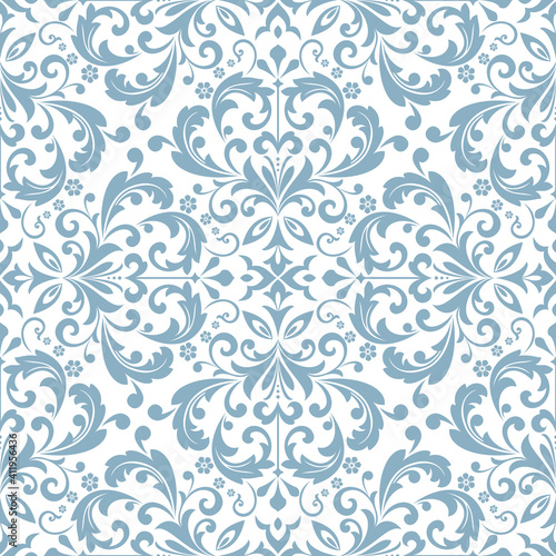 Wallpaper in the style of Baroque. Seamless vector background. White and blue floral ornament. Graphic pattern for fabric, wallpaper, packaging. Ornate Damask flower ornament