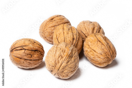 Shelled walnuts on a white background