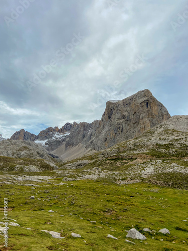 The upper start section of hiking track PR-PNP 24 to the magnificient summits of Mounts Pena Remona, Torre de Salinas, La Padierna and Pico de San Carlos at Picos de Europa National Park, Spain.