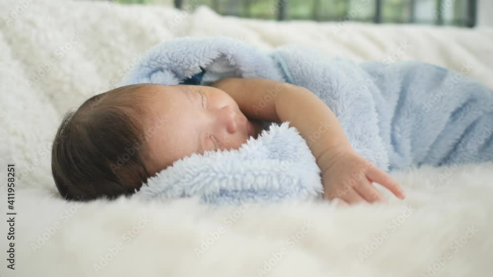 baby sleeping on soft bed, concept of newborn child infant baby sleeping on soft bed, concept of newborn child infant